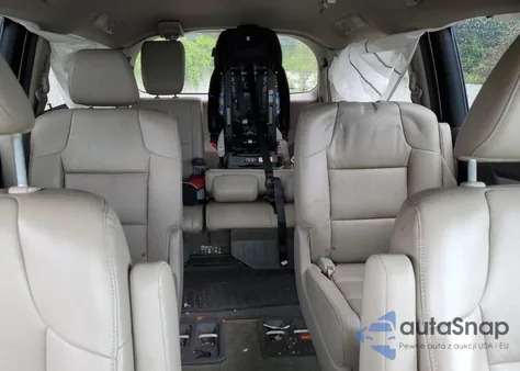 2015 Honda Odyssey Touring z USA, uszkodzony, nr VIN 5FNRL5H90FB057629